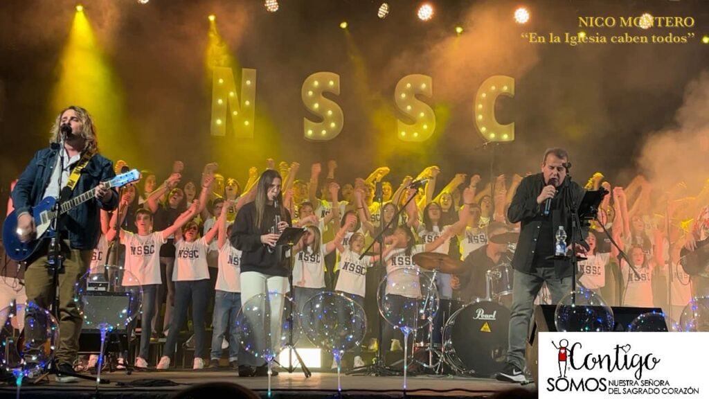 Puede ser una imagen de 5 personas, saxofón, violín, guitarra, multitud y texto que dice "ጣቃ NICO mCς TERO "En la Iglesia caben todos' SSC S SC NSSC N99C NS 15SL Nss) NSSO ISS KSS Rod ¡Contigo SOMOS NUESTRASEÑORA SÖMOSMUBTRASEIORA. OSDE_SAGRADOCORAZÓN SEÑORA NUESTRA DELSAGRADOCORAZÓN"